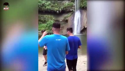 Terrifying moment man plunging to his death from a waterfall captured in MV of famous singer