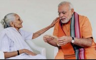 Mother Heeraben watches Narendra Modi taking oath as PM