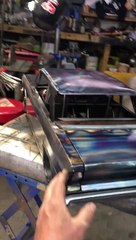 Man Beautifully Crafts Small 3D Metal Car