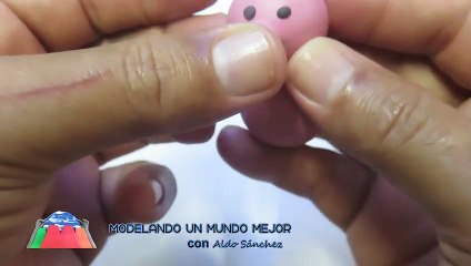 Modelando un Mundo Mejor Aldo Sanchez Haciendo un Cerdito de Plastilina