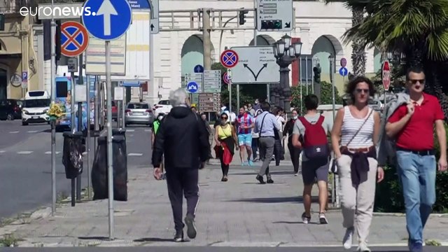 Extra police officers patrol Europe's streets and beaches as lockdown restrictions ease