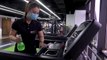 Beijing gym-goers welcome partial reopening