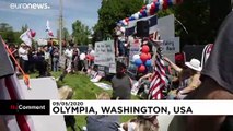 ABD'nin Washington eyaletinde sokağa çıkma yasağı protesto edildi