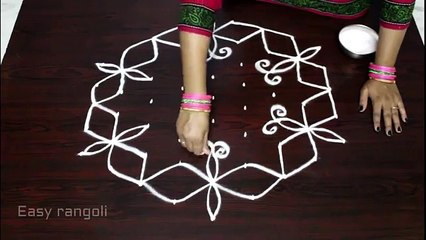 butterfly kolam, designs with 9x5 dots,    chukkala muggulu, designs with dots ,   easy rangoli designs