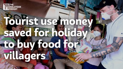 Tourist use money saved for holiday to buy food for villagers