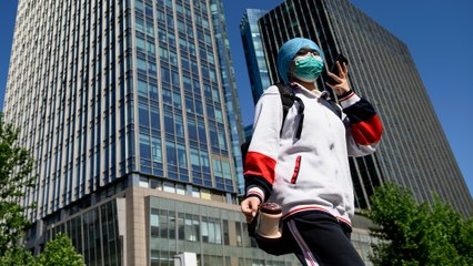China sees double-digit rises in Covid-19 infections with local cases in Wuhan and in the northeast