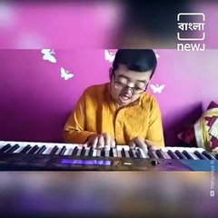 Watch A Specially-Abled Boy Pay Tribute To Rabindranath Tagore By Playing Rabindra Sangget