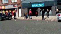 Queues form outside Greggs, in The Nook, South Shields, as the bakery giant begins reopening stores on a trial basis.