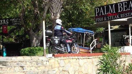 ANTALYA Sahilde güneşlenirken yakalandı, ceza yazan polise 'Yaz abi yaz, hak ettik' dedi