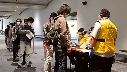 Indonesian fishermen return home after deaths on Chinese ships