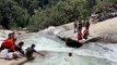 Video shows off-duty officer rescuing hiker trapped in California whirlpool