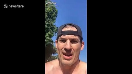 'What's up with Ahmaud then?' White man runs with TV in hand to expose motives behind Arbery's death