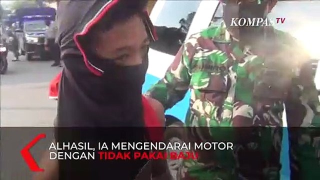 Demi Hindari Razia PSBB, Pemuda Ini Sulap Baju Jadi Masker