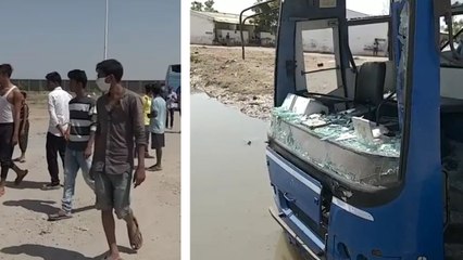 गुजरात: ट्रेन रद्द होने से हिंसक हुए निरमा के मजदूर, बस घेरकर फोड़े शीशे, तोड़ीं खिड़कियां Video