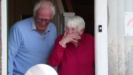 Couple's surprise 'cheer' for their 60th wedding anniversary