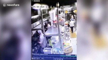 Restaurant in China suspended and apologises after cook allegedly spits on food