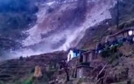 Watch: Massive landslides crush vehicles, block roads