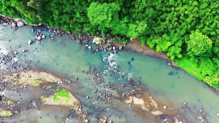 A Woman Making Faces While Lying In Bed.
