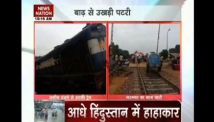 Floods throw road, rail services off track