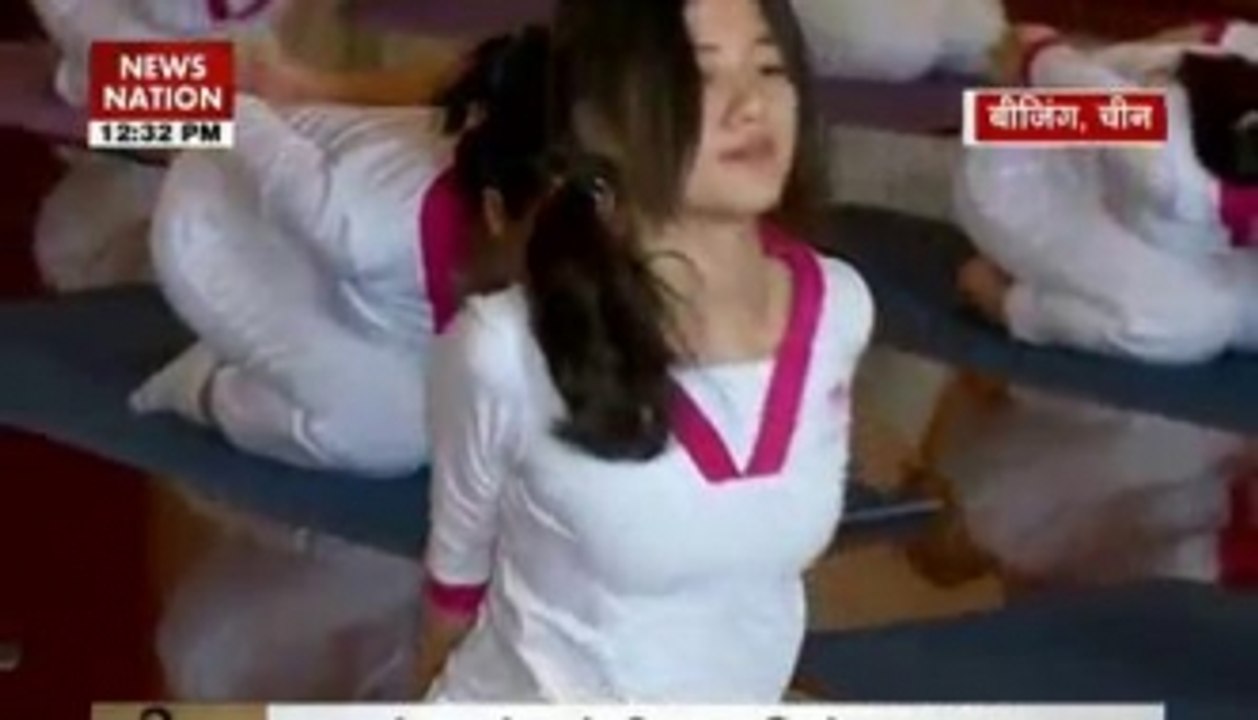 Indian trainers teach Yoga in China