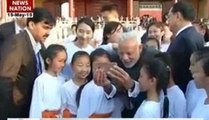 Modi clicks selfies with children in Beijing