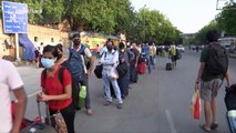 Thousands line up to board trains as Indian Railways resume services