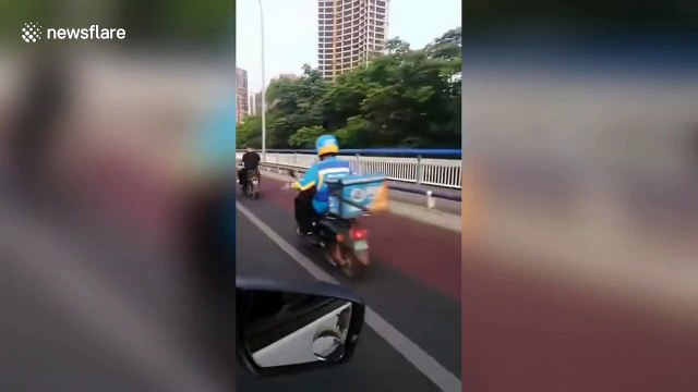 Chinese woman captured driving go-kart on busy road
