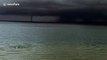 Rare double waterspout forming over the sea amazes locals in southern Thailand