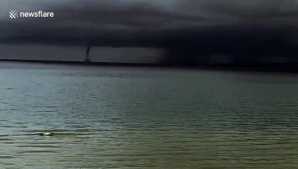 Rare double waterspout forming over the sea amazes locals in southern Thailand