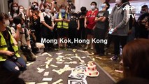 Arrests as protesters 'celebrate' Hong Kong leader's birthday