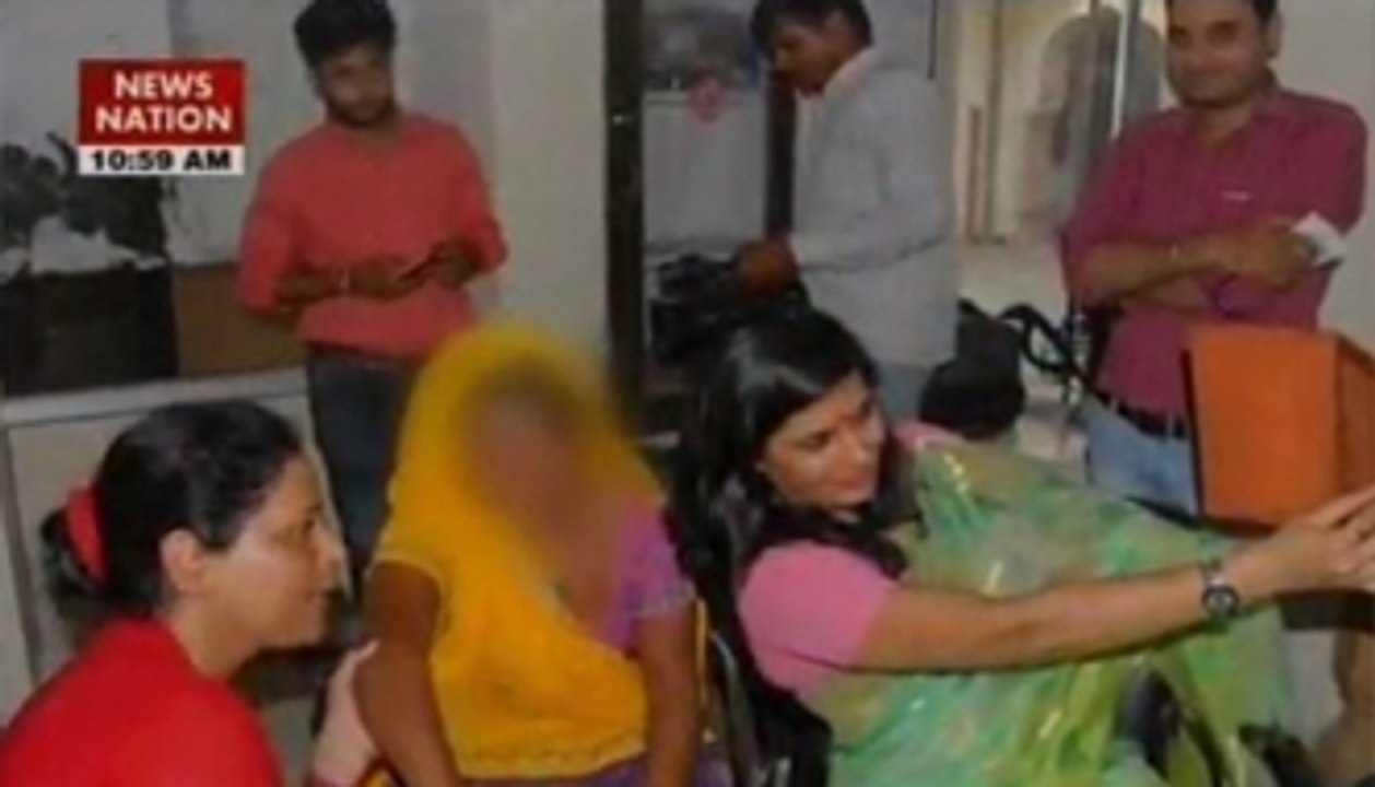 Women commission member clicks selfie with rape victim