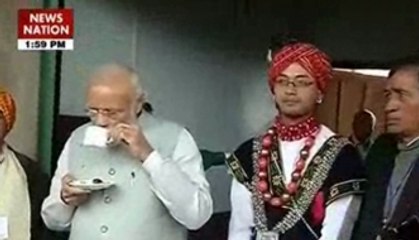 PM Narendra Modi sips tea, tries hands on drums in Meghalaya