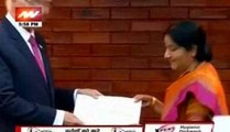 Sartaj Aziz hands over SAARC summit invitation to Sushma Swaraj in Pokhara