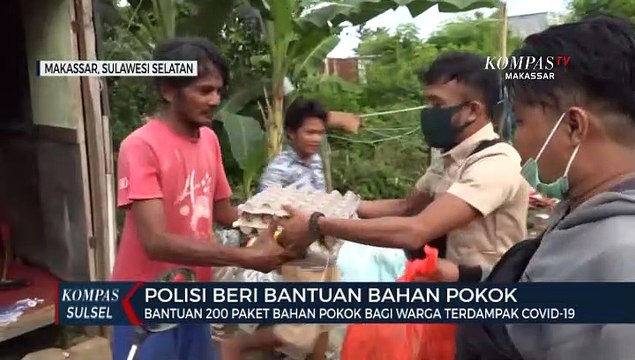 Polisi Beri Bantuan 200 Paket Bahan Pokok Bagi Warga Terdampak Covid-19