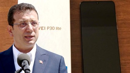 Tasarruf vurgusu yapan İmamoğlu, muhtarlara 2.600 liralık akıllı telefon hediye etti
