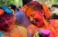 Happy Holi 2018: People get into celebratory mood with festival of colours