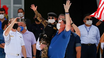 Brazil’s president pushes for end to lockdown
