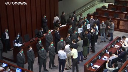 Clashes in Hong Kong's legislature after pro-Beijing lawmaker elected to lead key committee