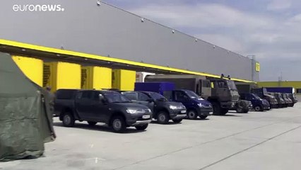 Soldaten gegen Coronavirus bei Paket-Verteiler