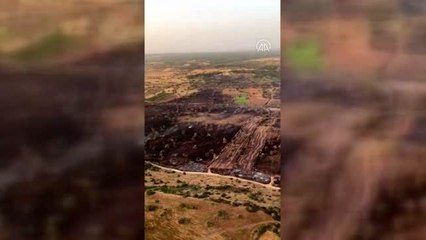 KKTC Tarım Bakanı Oğuz, yangın bölgesinde incelemelerde bulundu