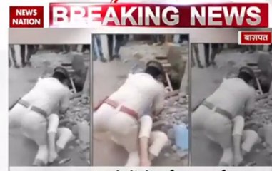 Policeman fights with youth in Bagpat
