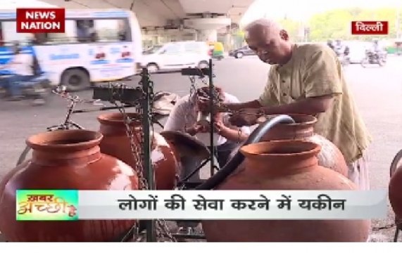68 year-old Natrajan provides drinking water to passer-by on roads of Delhi