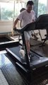 Jack Russell Terrier Joins Owner On Treadmill