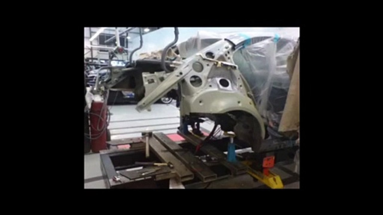 BMW 5 E60 crash repair on a Celette bench, frame machine and collision repair equipment