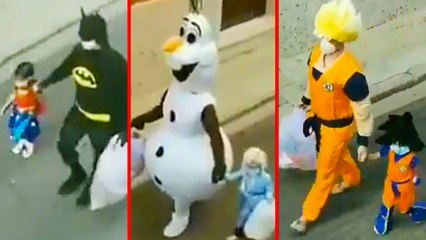 Father and Daughter with different costumes to throw trash