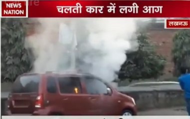 Man jumps out of car after vehicle catches fire