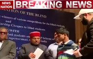 Blind people awarded scholarships and mobiles on Louis Braille's birth anniversary