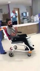 Khurram Khan clapped out of hospital