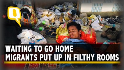 Migrants Made to Wait in Filth and Chaos After Registering to Go Home