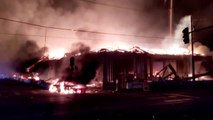 Looting, fire erupts in Minneapolis over racially charged killing by police